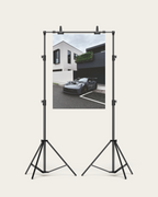 No. 00010 – The Grey Street Coupe – poster print mockup on a neutral wall.
