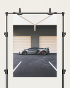 No. 00015 – The Grey Hangar – poster print mockup on a neutral wall.